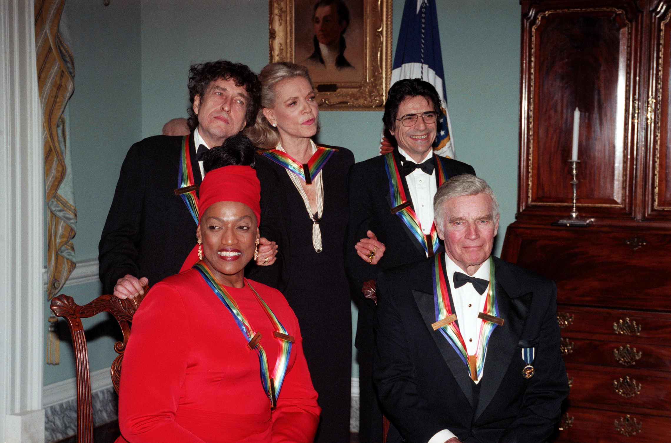 Jessye Norman joins her fellow 1997 Kennedy Center Honorees: singer Bob Dylan, actress Lauren Bacall, dancer Edward Villella and actor Charlton Heston. (© Matthew Mendelsohn/CORBIS)